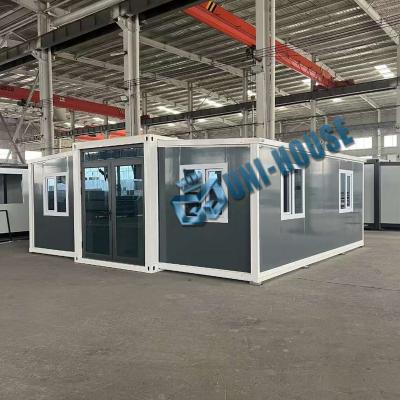 Extended foldable prefab container homes/40ft folding living container/expandable cabin foldable container house en venta
